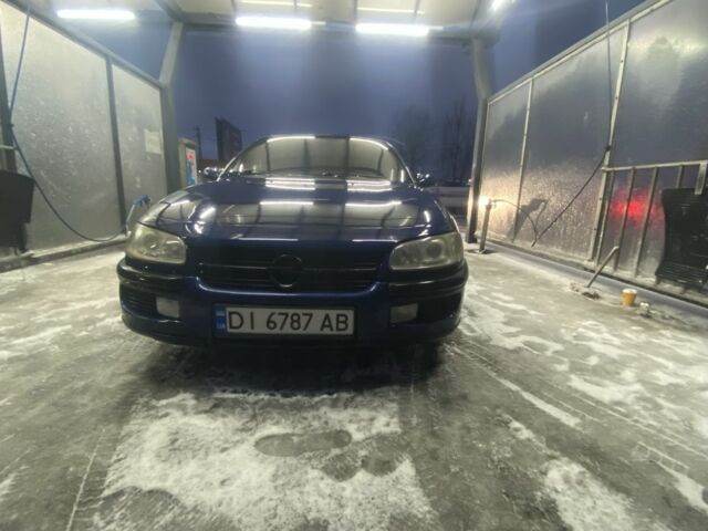 Синій Опель Омега, об'ємом двигуна 2 л та пробігом 345 тис. км за 1700 $, фото 1 на Automoto.ua