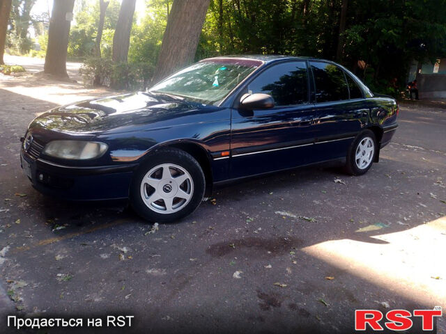 Синій Опель Омега, об'ємом двигуна 2 л та пробігом 123 тис. км за 3000 $, фото 4 на Automoto.ua