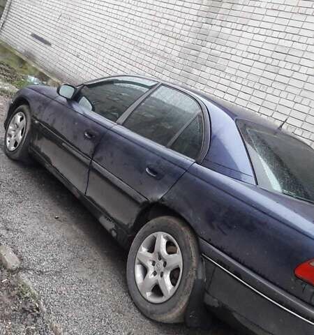 Синій Опель Омега, об'ємом двигуна 2.5 л та пробігом 250 тис. км за 2300 $, фото 5 на Automoto.ua