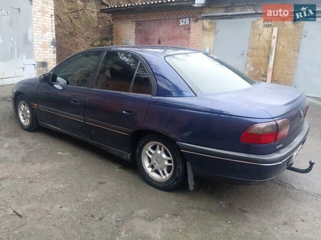 Синій Опель Омега, об'ємом двигуна 2 л та пробігом 294 тис. км за 2000 $, фото 28 на Automoto.ua