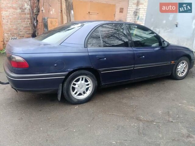 Синій Опель Омега, об'ємом двигуна 2 л та пробігом 294 тис. км за 2000 $, фото 10 на Automoto.ua