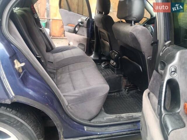 Синій Опель Омега, об'ємом двигуна 2 л та пробігом 294 тис. км за 2000 $, фото 25 на Automoto.ua