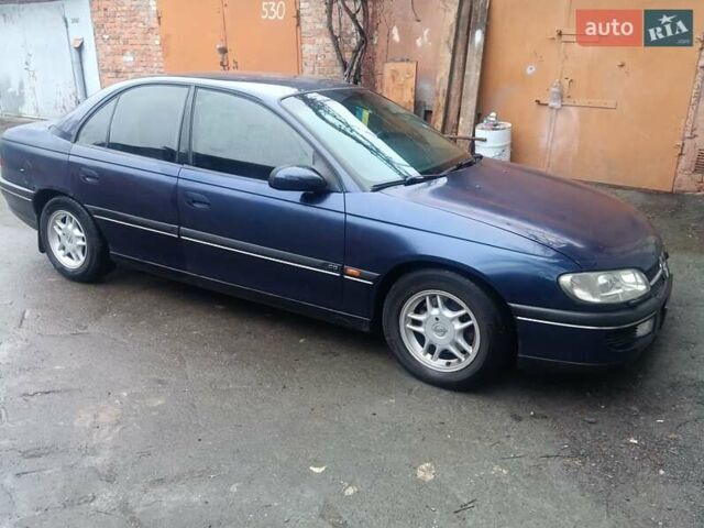 Синій Опель Омега, об'ємом двигуна 2 л та пробігом 294 тис. км за 2000 $, фото 14 на Automoto.ua