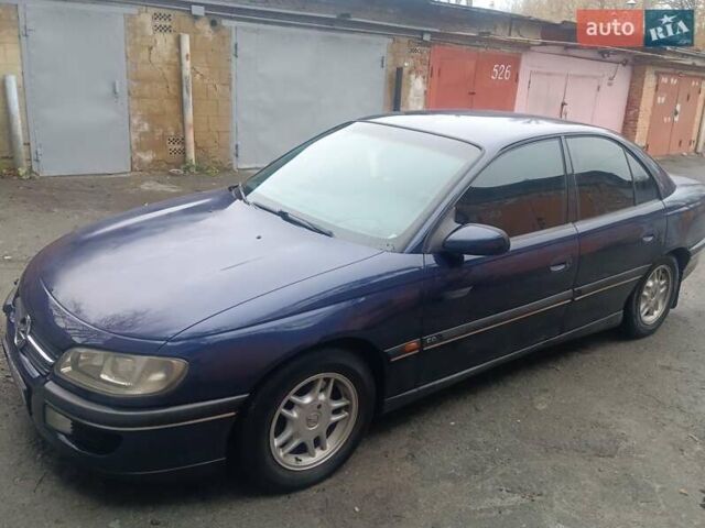 Синій Опель Омега, об'ємом двигуна 2 л та пробігом 294 тис. км за 2000 $, фото 18 на Automoto.ua