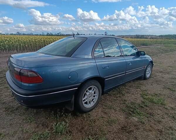 Синий Опель Омега, объемом двигателя 2 л и пробегом 171 тыс. км за 3500 $, фото 5 на Automoto.ua