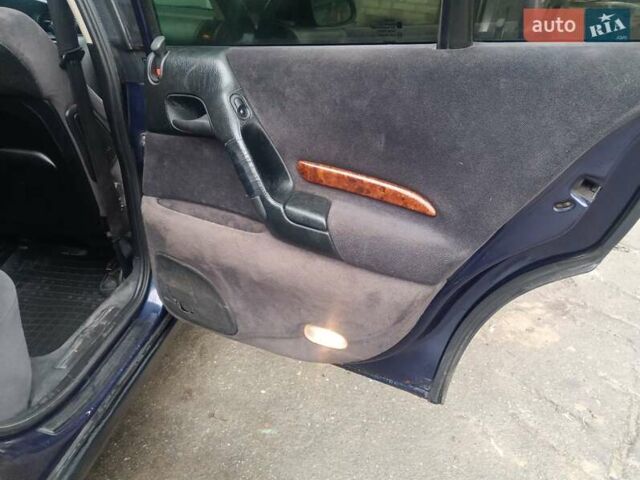 Синій Опель Омега, об'ємом двигуна 2 л та пробігом 294 тис. км за 2000 $, фото 21 на Automoto.ua