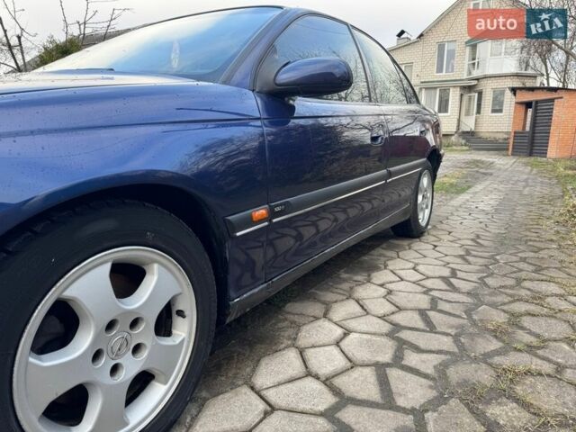 Синий Опель Омега, объемом двигателя 2 л и пробегом 325 тыс. км за 2450 $, фото 4 на Automoto.ua