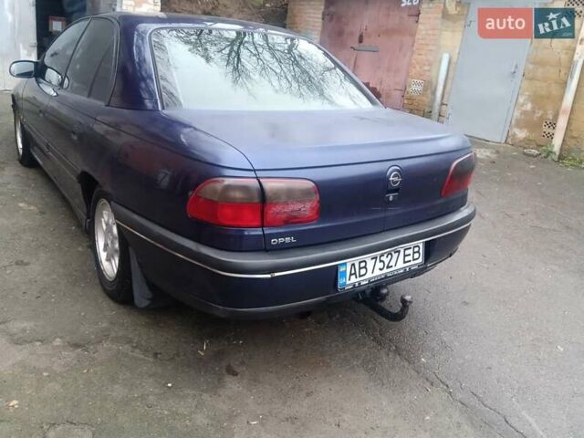 Синій Опель Омега, об'ємом двигуна 2 л та пробігом 294 тис. км за 2000 $, фото 12 на Automoto.ua