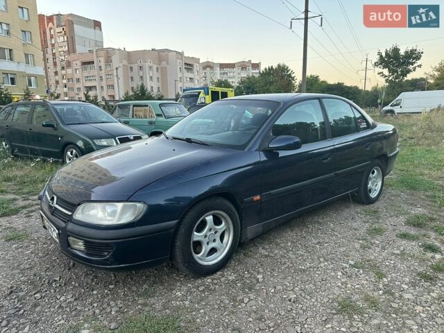 Синій Опель Омега, об'ємом двигуна 2 л та пробігом 248 тис. км за 1350 $, фото 2 на Automoto.ua