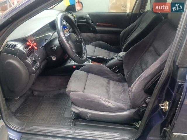 Синій Опель Омега, об'ємом двигуна 2 л та пробігом 294 тис. км за 2000 $, фото 19 на Automoto.ua