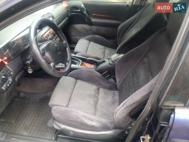 Синій Опель Омега, об'ємом двигуна 2 л та пробігом 294 тис. км за 2000 $, фото 3 на Automoto.ua