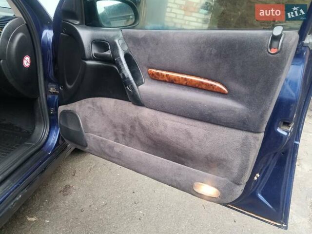 Синій Опель Омега, об'ємом двигуна 2 л та пробігом 294 тис. км за 2000 $, фото 22 на Automoto.ua