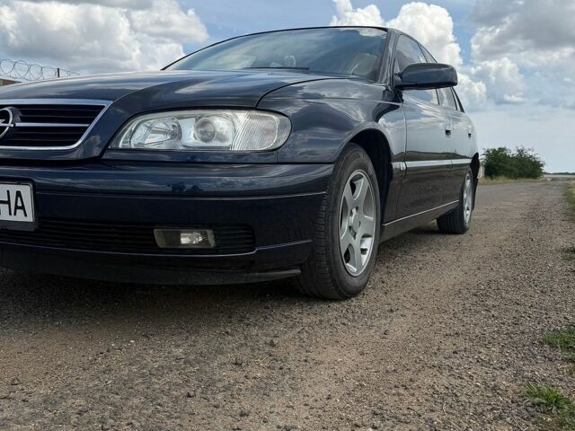 Синій Опель Омега, об'ємом двигуна 2 л та пробігом 240 тис. км за 4000 $, фото 10 на Automoto.ua