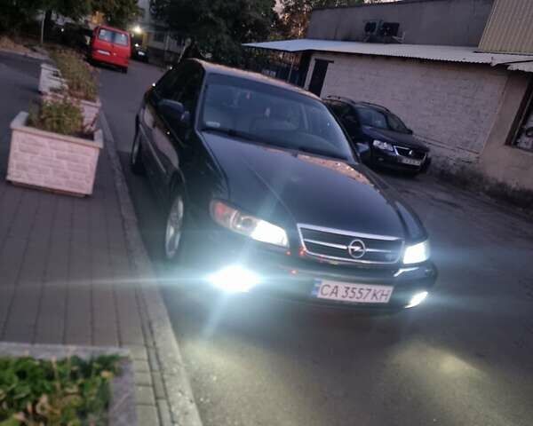 Синий Опель Омега, объемом двигателя 2.2 л и пробегом 251 тыс. км за 3500 $, фото 2 на Automoto.ua