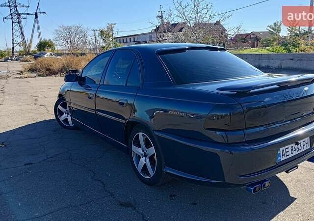 Синий Опель Омега, объемом двигателя 3 л и пробегом 350 тыс. км за 4500 $, фото 26 на Automoto.ua