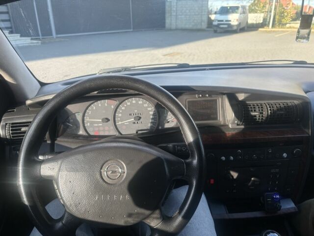 Синий Опель Омега, объемом двигателя 2 л и пробегом 346 тыс. км за 2199 $, фото 5 на Automoto.ua