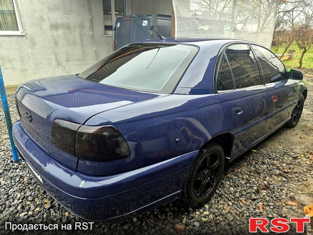 Синий Опель Омега, объемом двигателя 2 л и пробегом 130 тыс. км за 3060 $, фото 2 на Automoto.ua