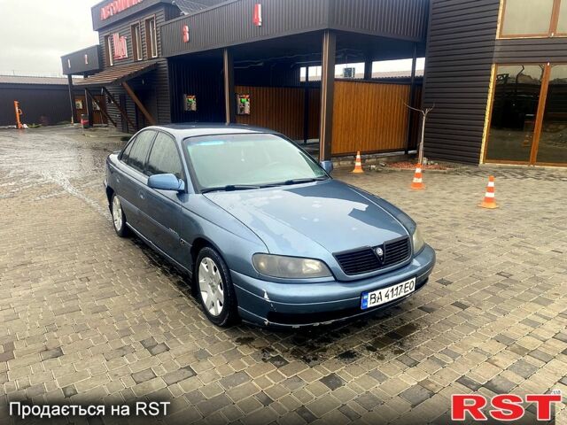 Синій Опель Омега, об'ємом двигуна 3 л та пробігом 168 тис. км за 1900 $, фото 5 на Automoto.ua