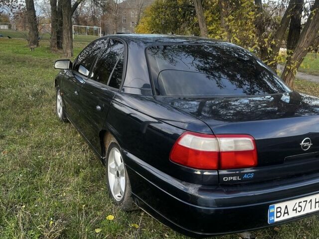 Синий Опель Омега, объемом двигателя 2.2 л и пробегом 233 тыс. км за 2750 $, фото 4 на Automoto.ua