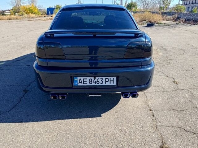 Синий Опель Омега, объемом двигателя 2 л и пробегом 350 тыс. км за 4500 $, фото 23 на Automoto.ua