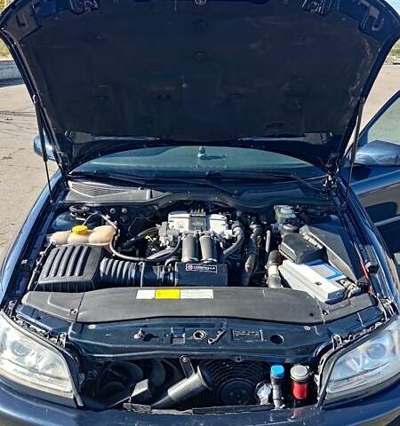 Синий Опель Омега, объемом двигателя 3 л и пробегом 350 тыс. км за 4500 $, фото 3 на Automoto.ua