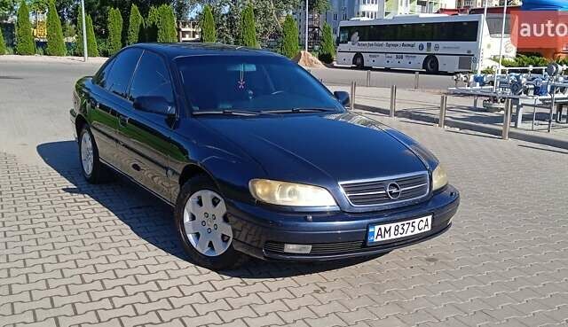 Синий Опель Омега, объемом двигателя 2.2 л и пробегом 350 тыс. км за 3100 $, фото 1 на Automoto.ua