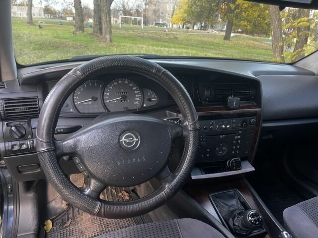 Синий Опель Омега, объемом двигателя 2.2 л и пробегом 233 тыс. км за 2750 $, фото 8 на Automoto.ua