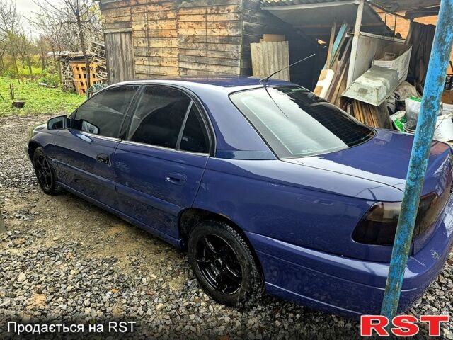 Синий Опель Омега, объемом двигателя 2 л и пробегом 130 тыс. км за 3060 $, фото 4 на Automoto.ua