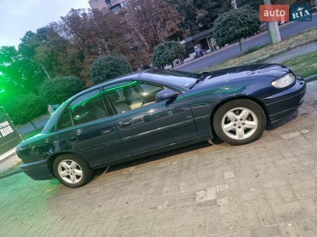 Синий Опель Омега, объемом двигателя 2.2 л и пробегом 251 тыс. км за 3500 $, фото 8 на Automoto.ua