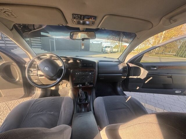 Синий Опель Омега, объемом двигателя 2 л и пробегом 346 тыс. км за 2199 $, фото 4 на Automoto.ua