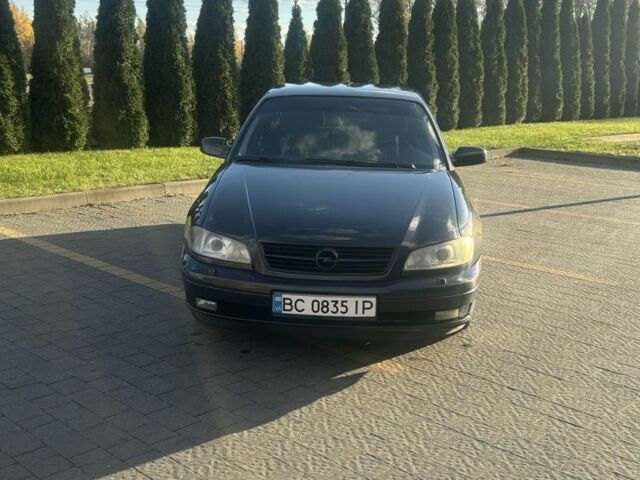 Синий Опель Омега, объемом двигателя 2 л и пробегом 346 тыс. км за 2199 $, фото 1 на Automoto.ua