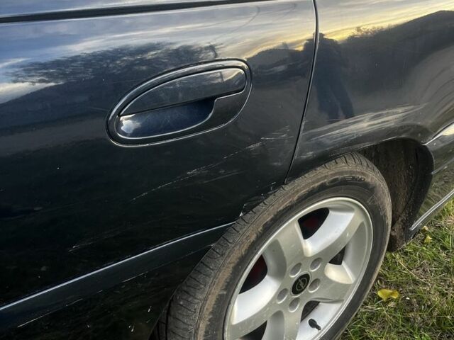 Синий Опель Омега, объемом двигателя 2.2 л и пробегом 233 тыс. км за 2750 $, фото 10 на Automoto.ua