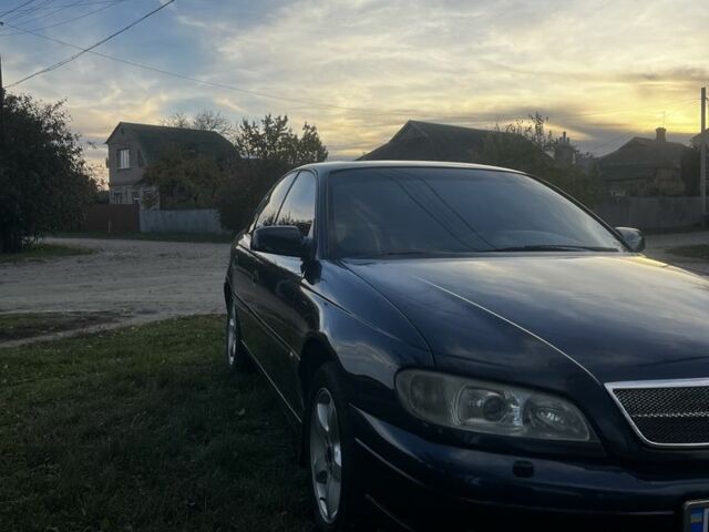 Синий Опель Омега, объемом двигателя 2.2 л и пробегом 233 тыс. км за 2750 $, фото 2 на Automoto.ua