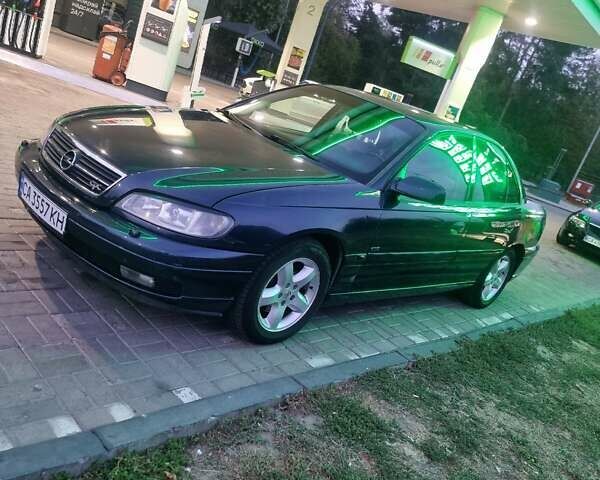 Синий Опель Омега, объемом двигателя 2.2 л и пробегом 251 тыс. км за 3500 $, фото 6 на Automoto.ua