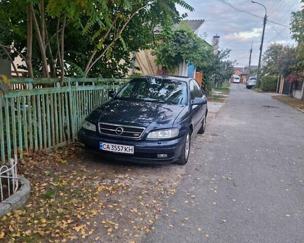 Синий Опель Омега, объемом двигателя 2.2 л и пробегом 251 тыс. км за 3500 $, фото 11 на Automoto.ua