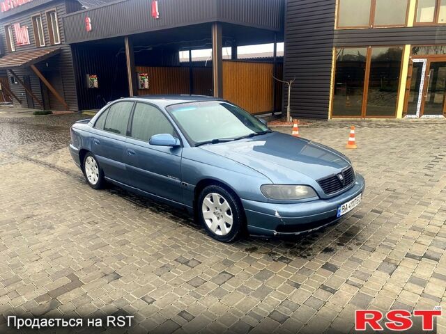 Синій Опель Омега, об'ємом двигуна 3 л та пробігом 168 тис. км за 1900 $, фото 2 на Automoto.ua