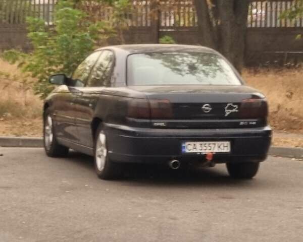 Синий Опель Омега, объемом двигателя 2.2 л и пробегом 251 тыс. км за 3500 $, фото 1 на Automoto.ua