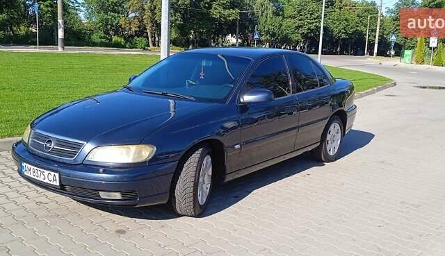 Синий Опель Омега, объемом двигателя 2.2 л и пробегом 350 тыс. км за 3100 $, фото 3 на Automoto.ua