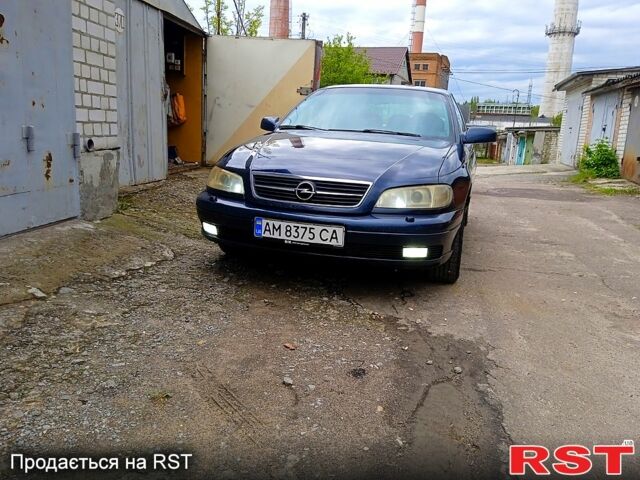 Синий Опель Омега, объемом двигателя 22 л и пробегом 350 тыс. км за 4150 $, фото 5 на Automoto.ua