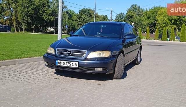 Синий Опель Омега, объемом двигателя 2.2 л и пробегом 350 тыс. км за 3100 $, фото 10 на Automoto.ua