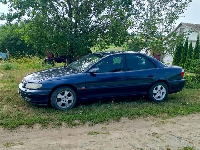 Синий Опель Омега, объемом двигателя 2.2 л и пробегом 315 тыс. км за 3000 $, фото 2 на Automoto.ua