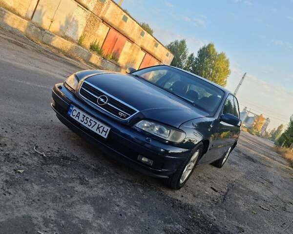 Синий Опель Омега, объемом двигателя 2.2 л и пробегом 251 тыс. км за 3500 $, фото 4 на Automoto.ua