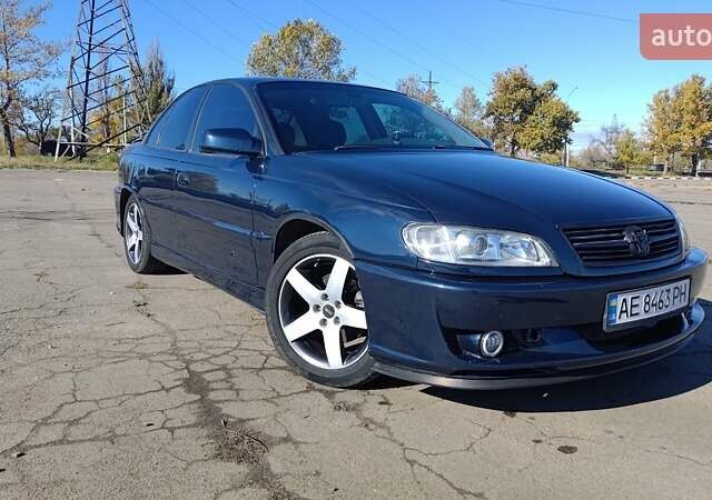 Синий Опель Омега, объемом двигателя 3 л и пробегом 350 тыс. км за 4500 $, фото 1 на Automoto.ua