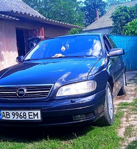 Синий Опель Омега, объемом двигателя 2.5 л и пробегом 342 тыс. км за 2700 $, фото 3 на Automoto.ua