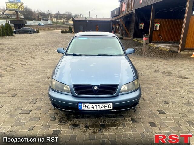 Синій Опель Омега, об'ємом двигуна 3 л та пробігом 168 тис. км за 1900 $, фото 7 на Automoto.ua