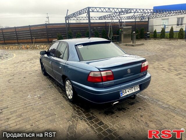 Синій Опель Омега, об'ємом двигуна 3 л та пробігом 168 тис. км за 1900 $, фото 8 на Automoto.ua