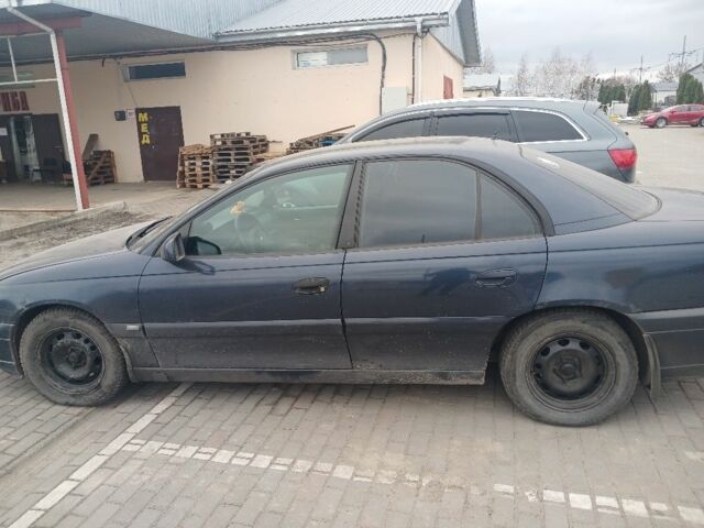 Синий Опель Омега, объемом двигателя 2.2 л и пробегом 680 тыс. км за 1900 $, фото 7 на Automoto.ua