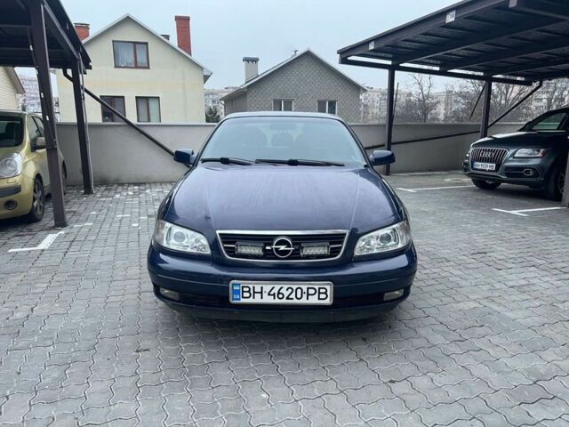 Синий Опель Омега, объемом двигателя 2.2 л и пробегом 367 тыс. км за 2818 $, фото 1 на Automoto.ua