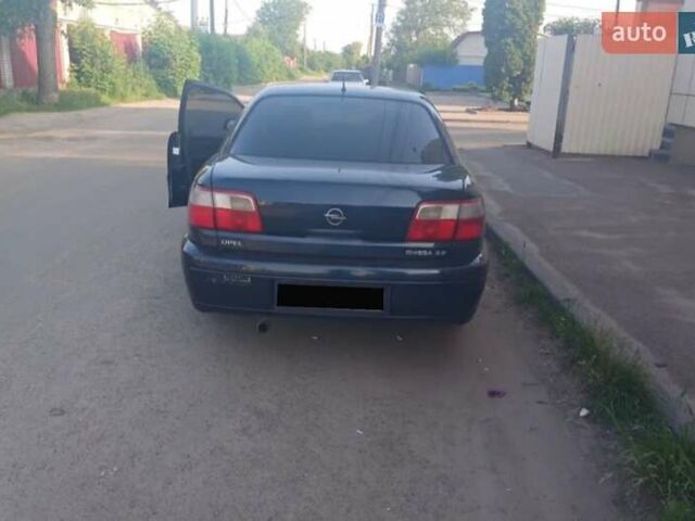 Синий Опель Омега, объемом двигателя 2.2 л и пробегом 668 тыс. км за 2500 $, фото 6 на Automoto.ua