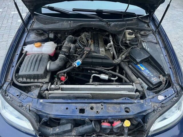 Синий Опель Омега, объемом двигателя 2.2 л и пробегом 367 тыс. км за 2818 $, фото 7 на Automoto.ua